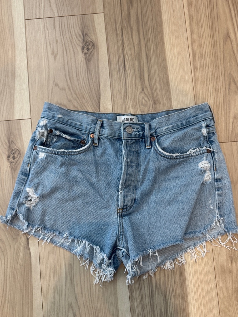 Agolde Light Wash Distressed Denim Cutoff Shorts